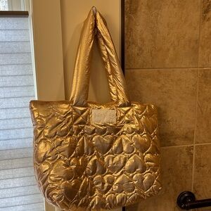 Julie and Judah rose gold metallic puffer bag. New. 
Heart design.
